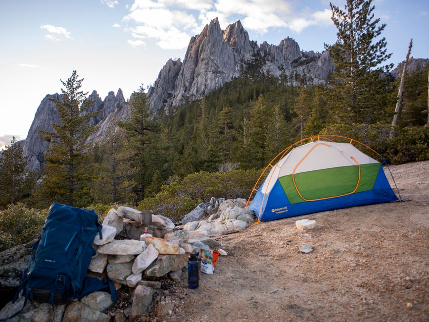 Scenic camping with tent and backpack at Castle Crags State Park, California.